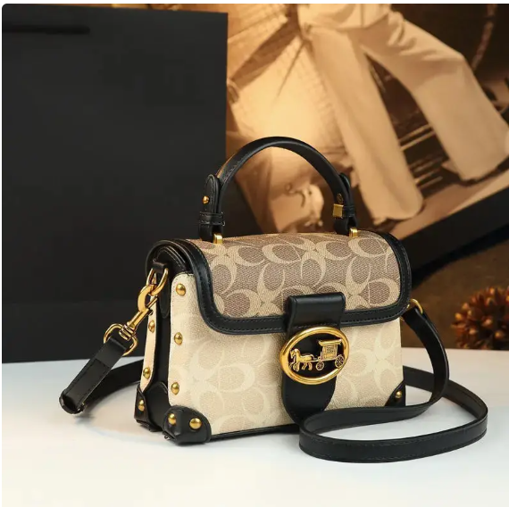 The Signature Charm Satchel