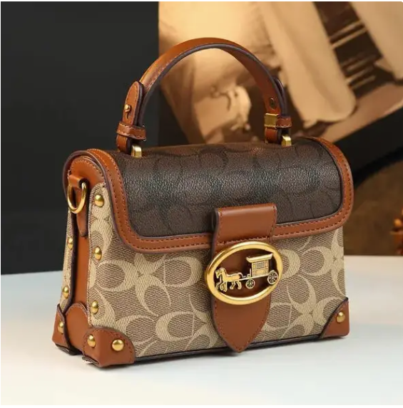 The Signature Charm Satchel