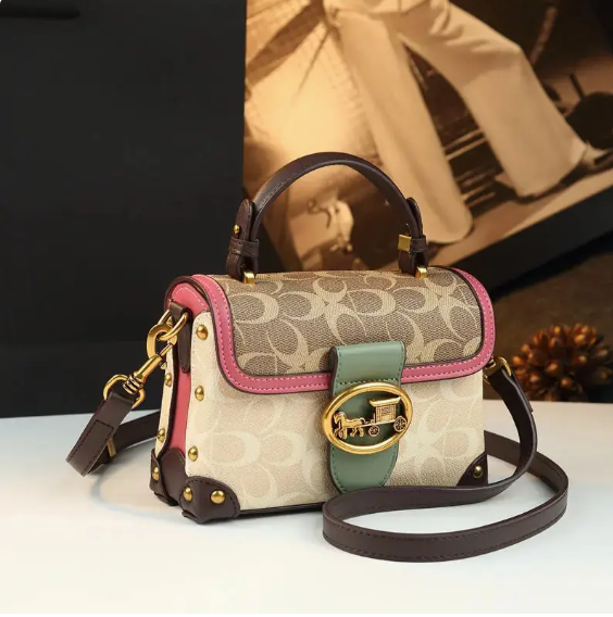 The Signature Charm Satchel
